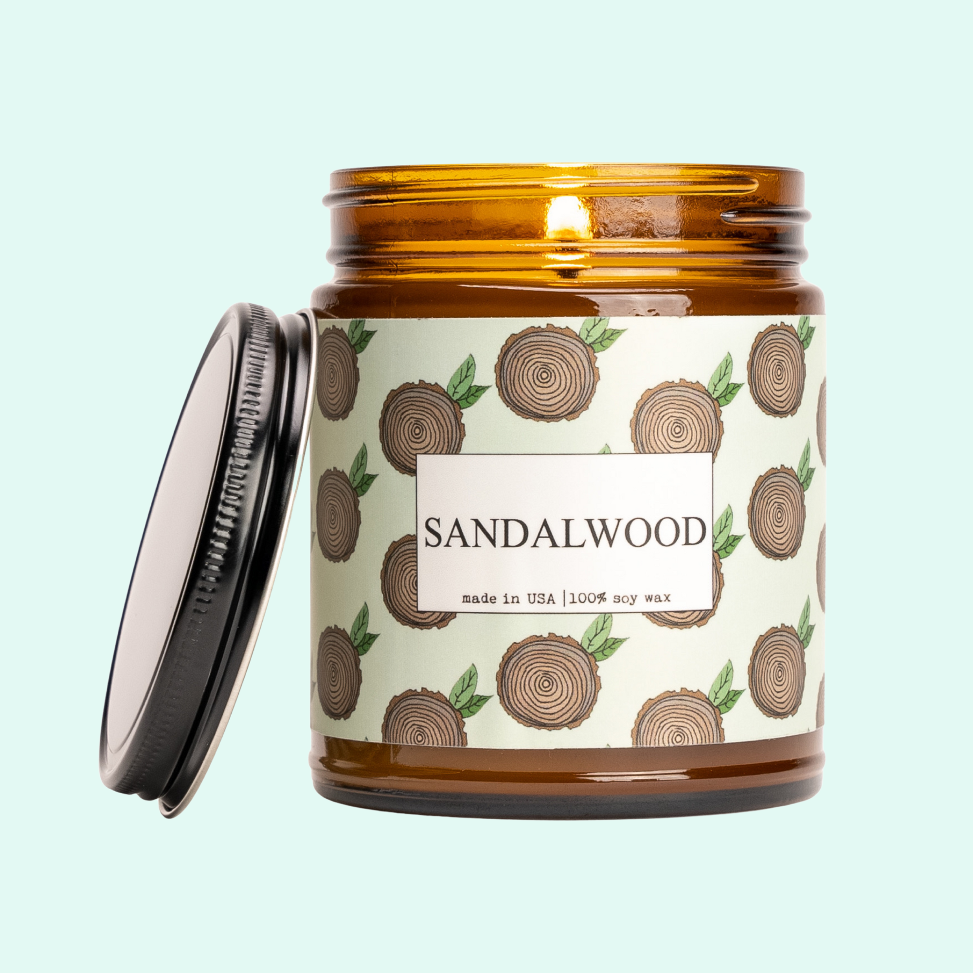 a jar of sandalwood candle with a lid