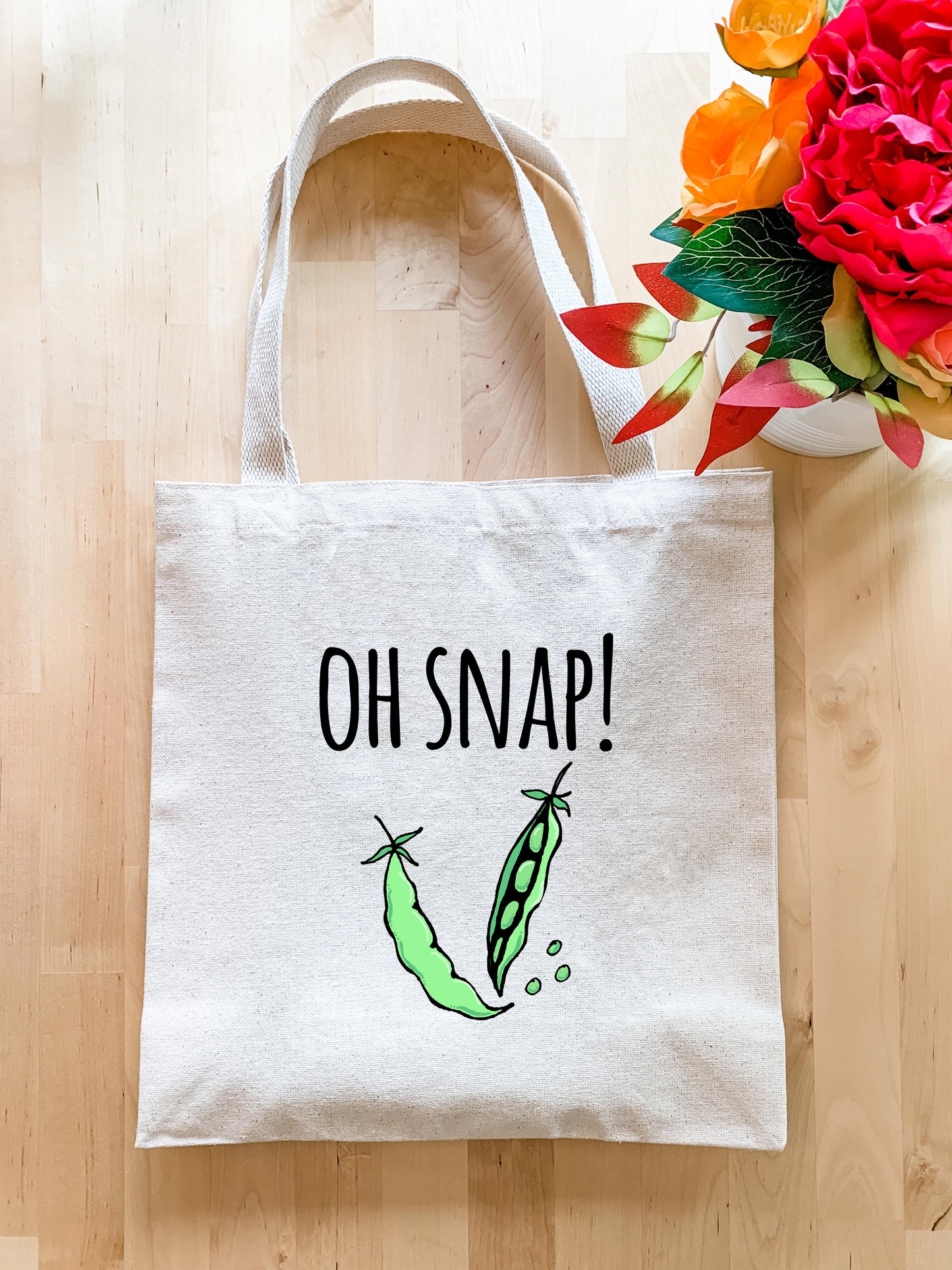 a tote bag with a picture of a pea on it