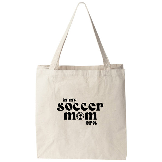 a tote bag with the words soccer mom on it