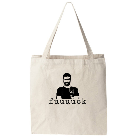 a tote bag with a picture of a man holding a glass of wine