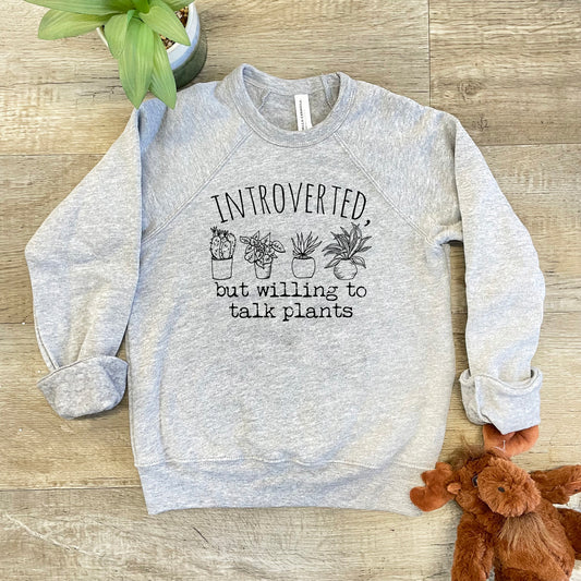 a sweatshirt that says, i'm trying to talk plants