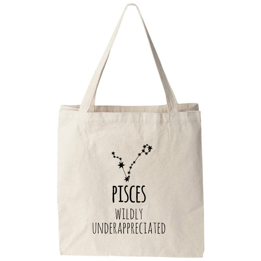 a white tote bag with the words pisces wildly underappered