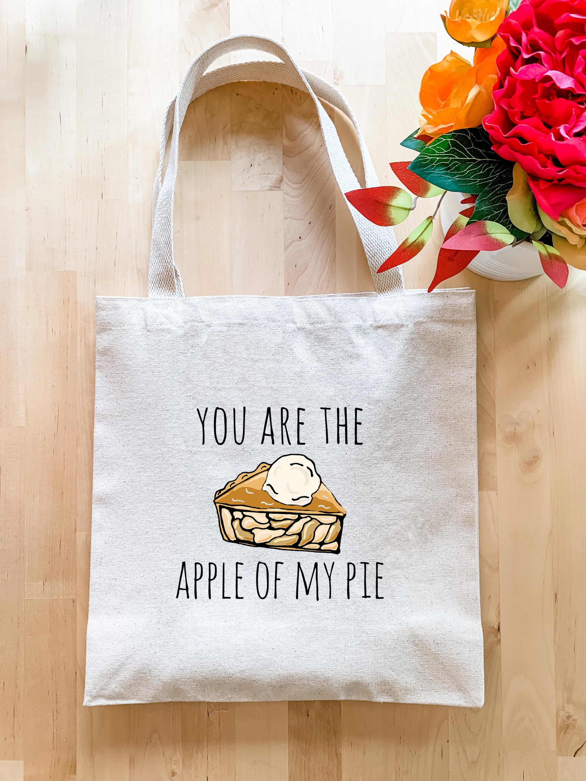 a tote bag with a picture of a pie on it