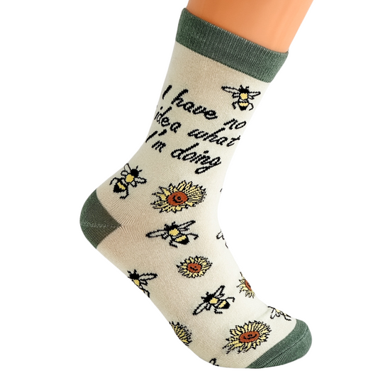 a pair of socks with bees on them