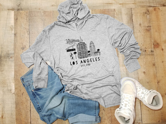 a gray hoodie with the words los angeles printed on it