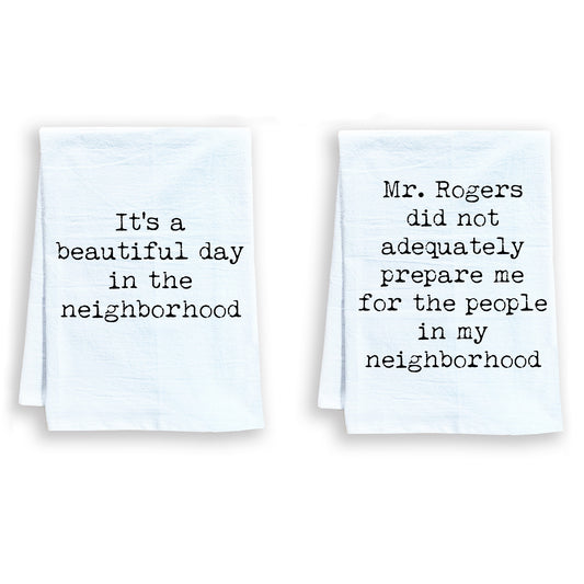 two tea towels with words written on them