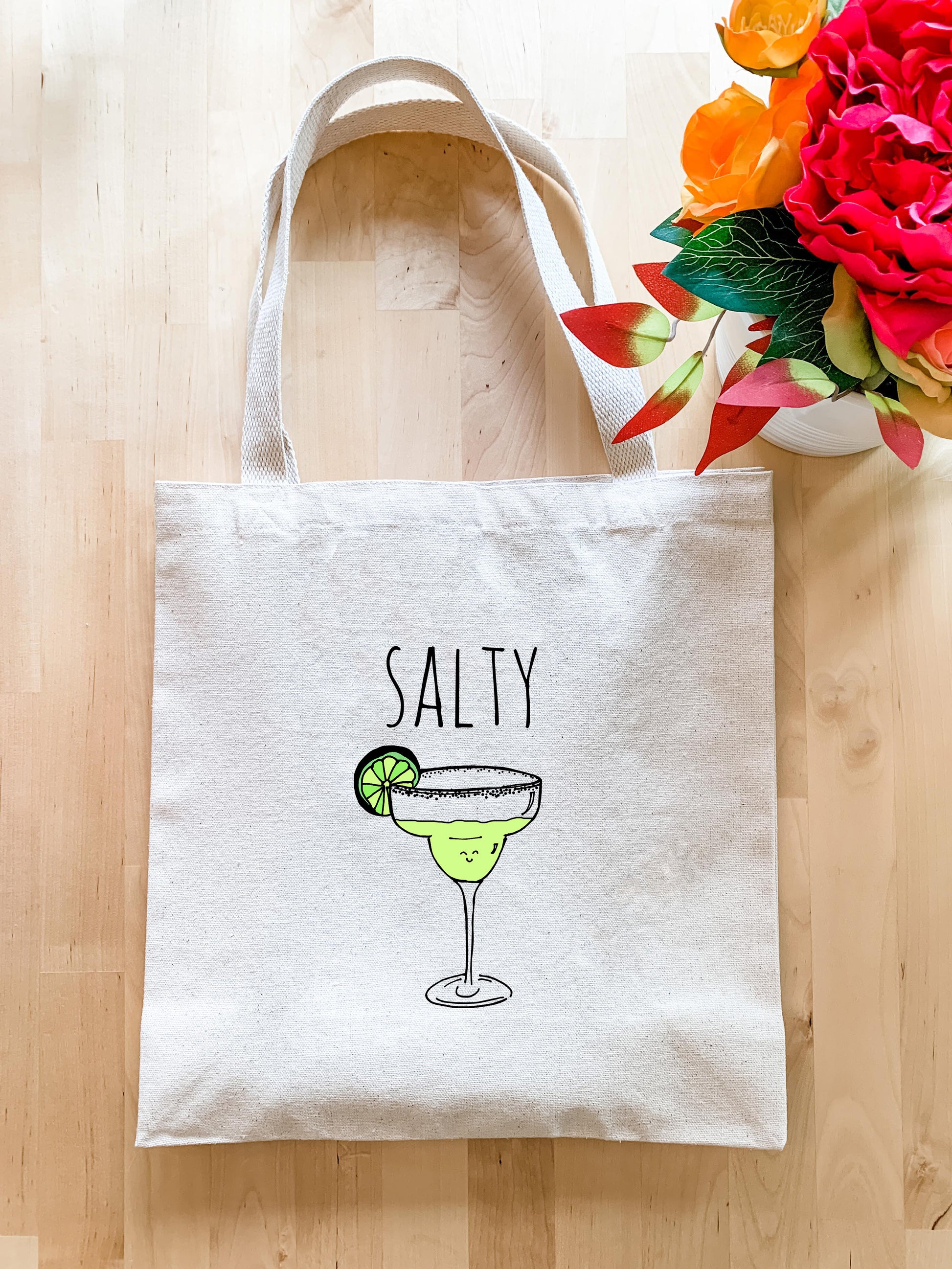 a tote bag with a picture of a cocktail on it
