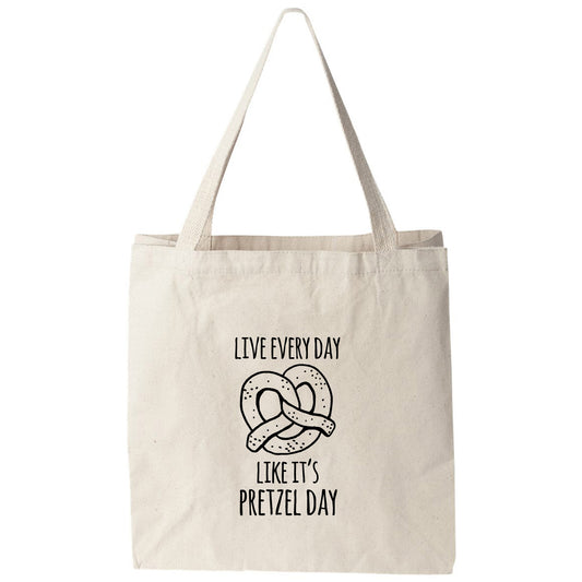 a tote bag that says live every day like it's pretzel