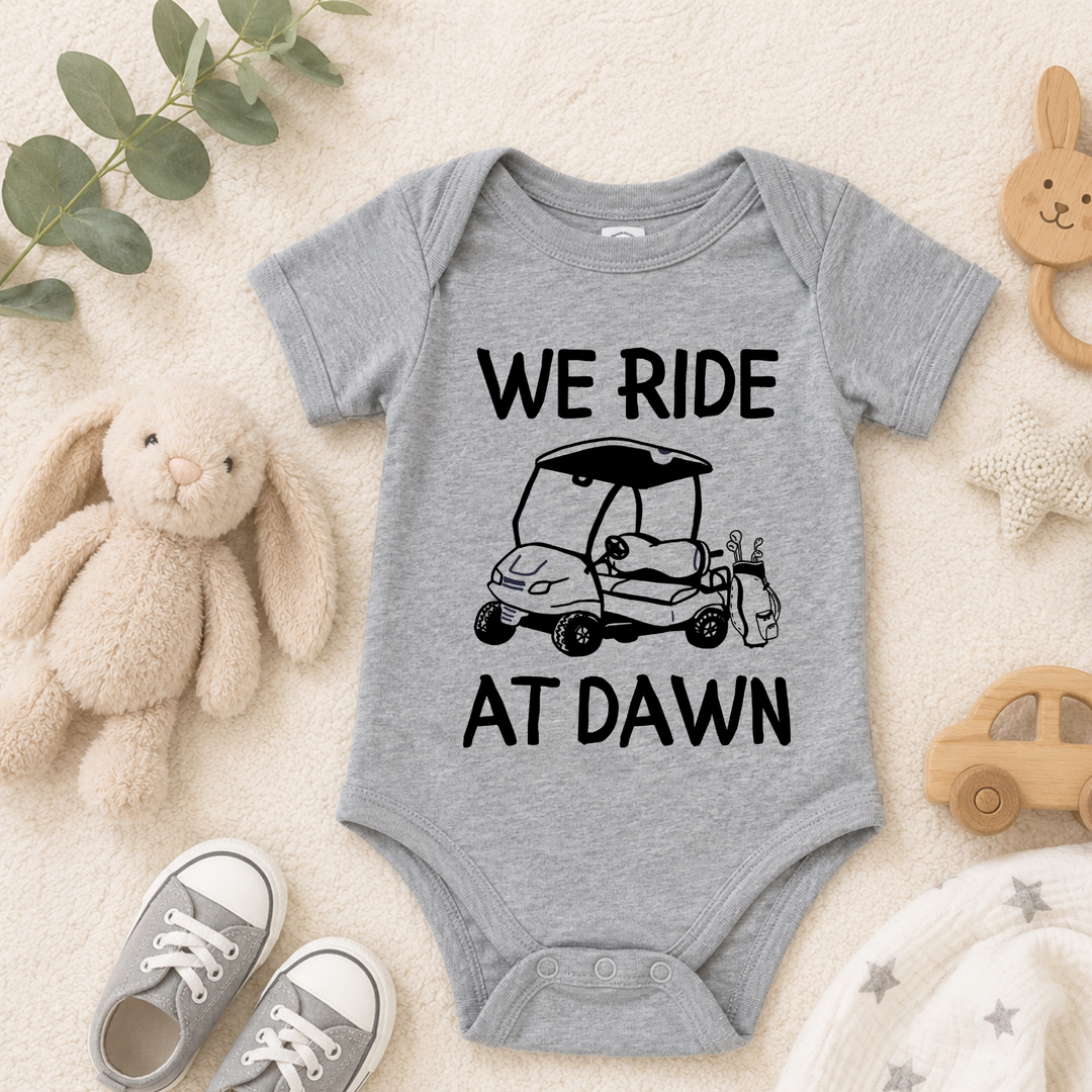 We Ride At Dawn Golf Baby Onesie | Funny Golf Baby Bodysuit