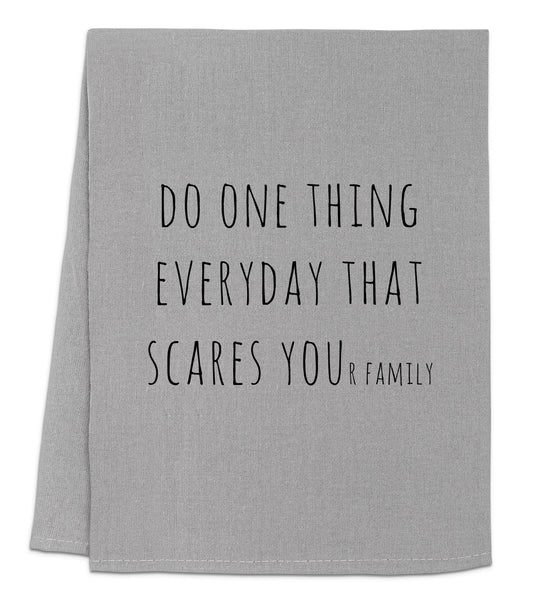 a gray towel with a black quote on it
