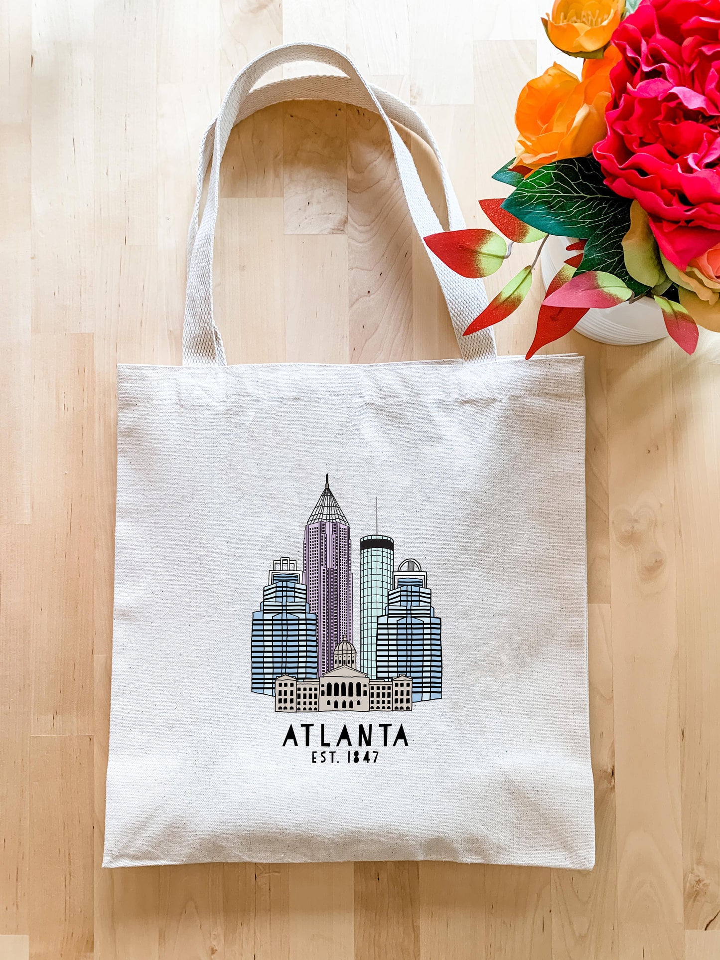 a tote bag with a picture of atlanta on it