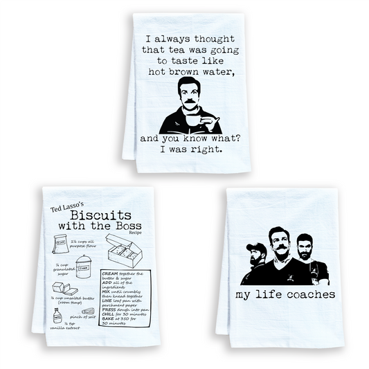 three tea towels with a picture of two men on them