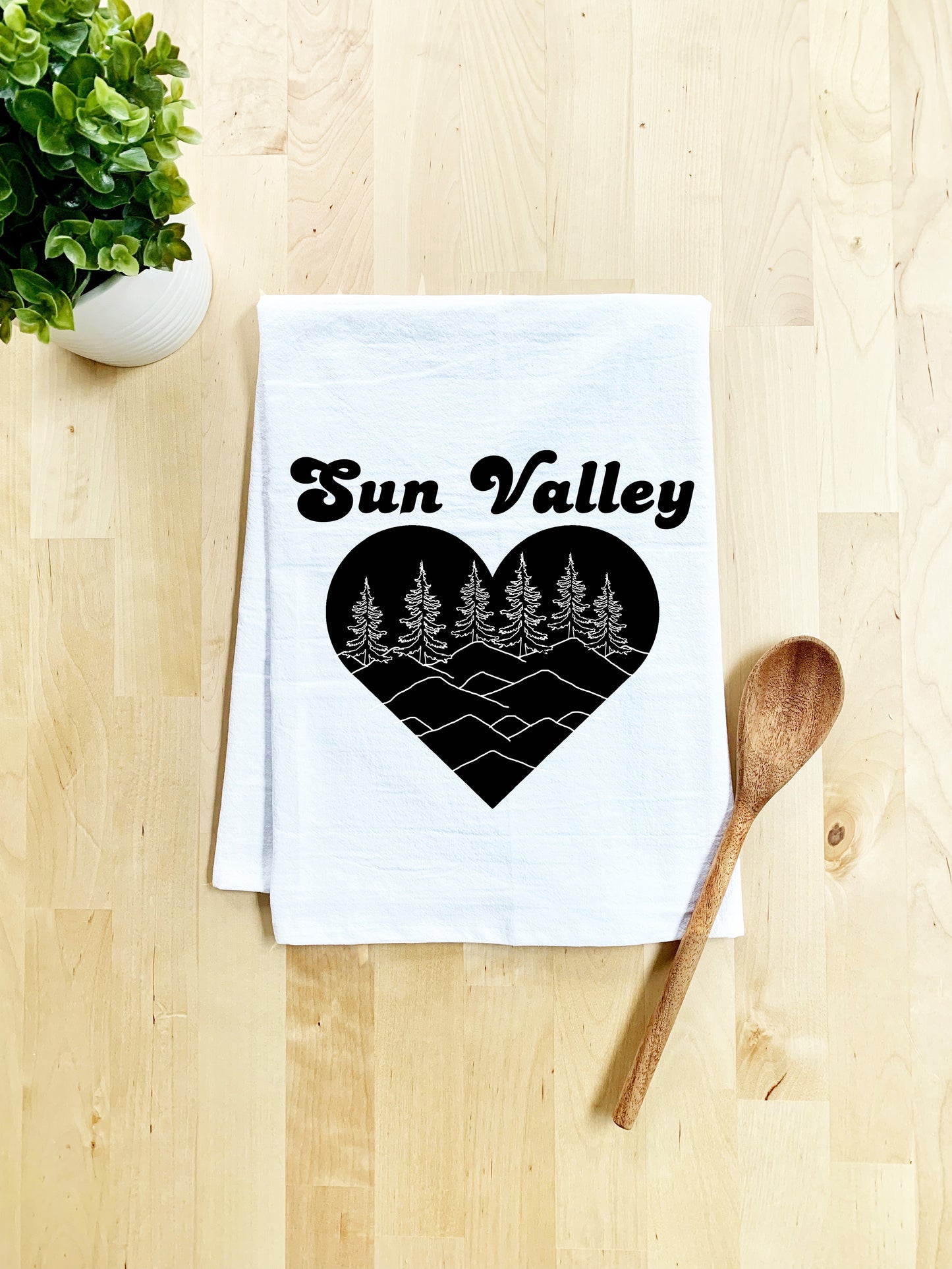 a tea towel with the words sun valley printed on it