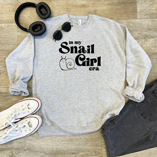 a sweatshirt that says i'm my snail girl on it