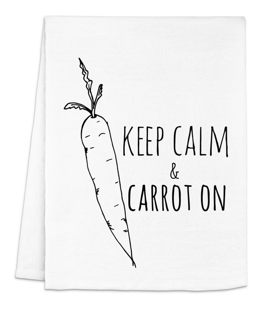 a white dish towel with a carrot drawn on it