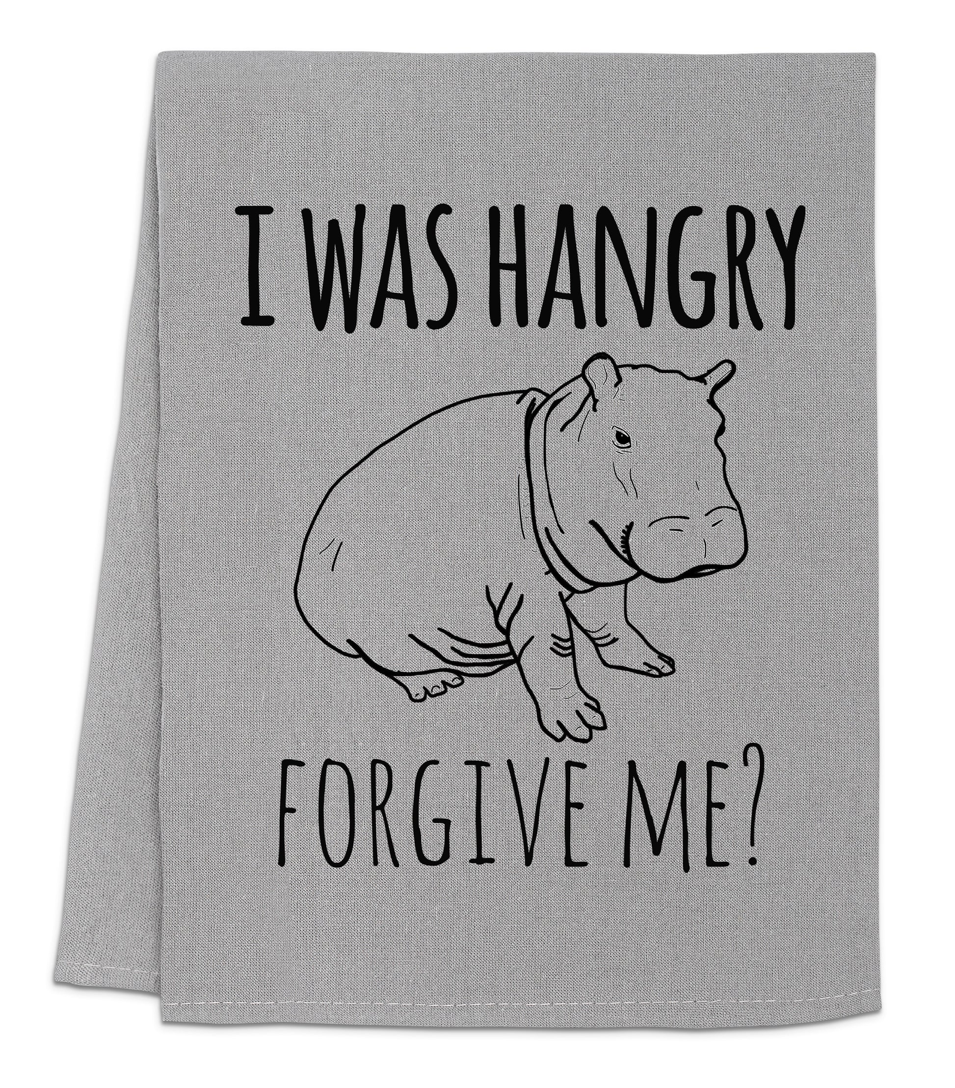 a towel with a hippo saying i was hungry for give me?