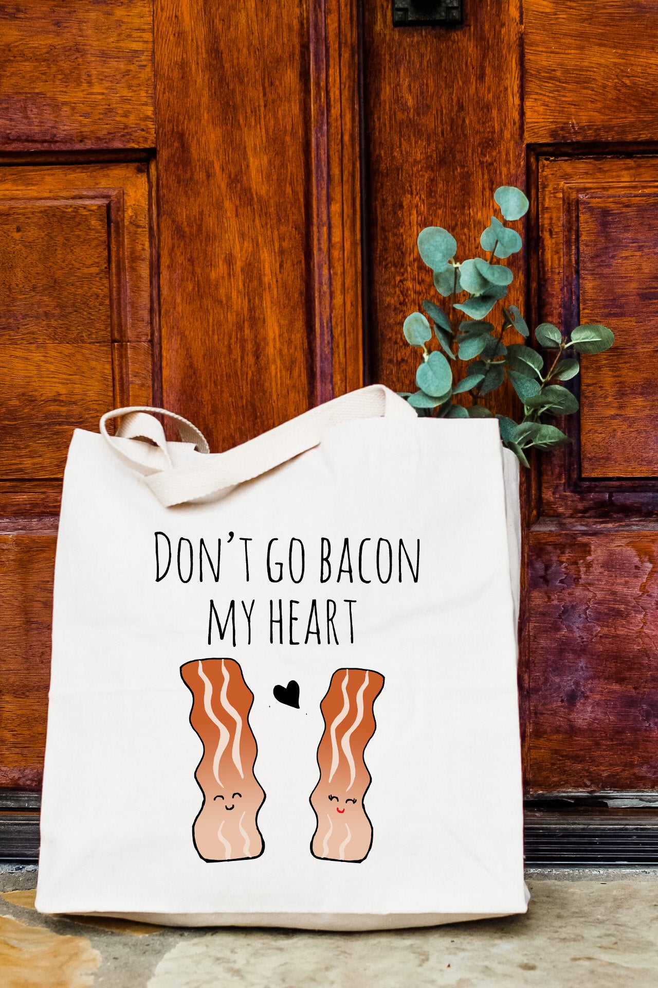 a tote bag with a picture of bacon on it