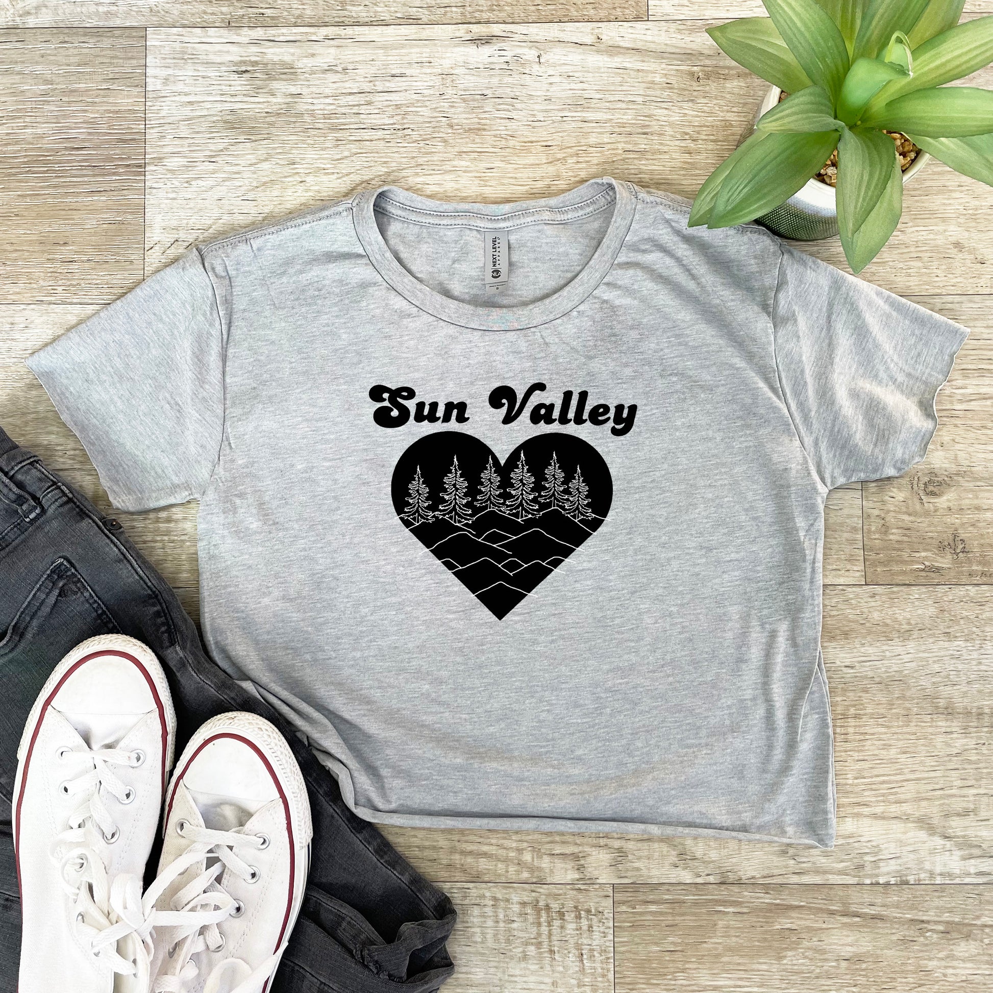 a t - shirt that says sun valley with a heart on it