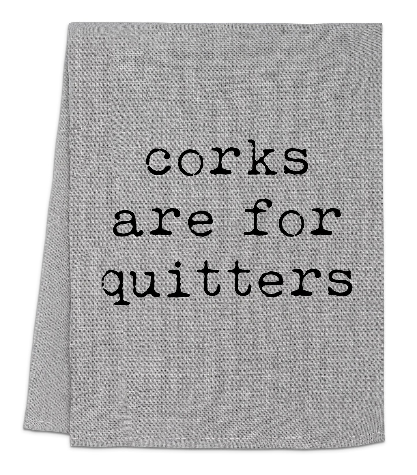 a gray towel with words on it that says cooks are for quitters