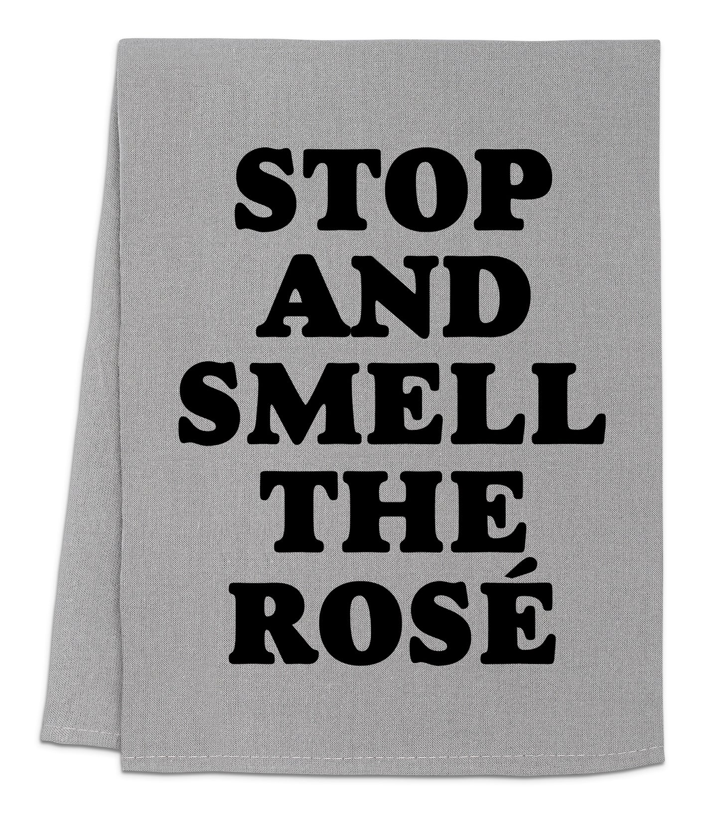 a towel that says stop and smell the rose
