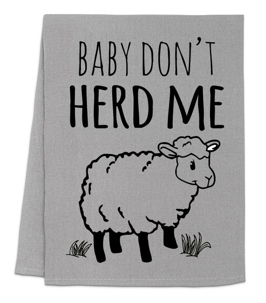 a baby don't herd me towel with a sheep on it