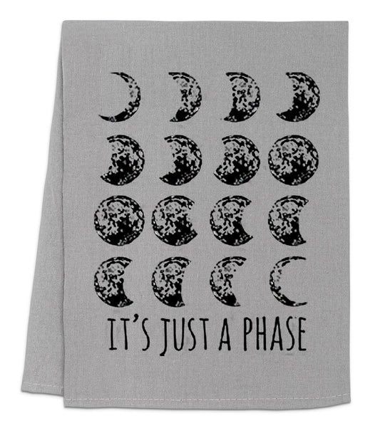 a towel with the words it's just a phase printed on it