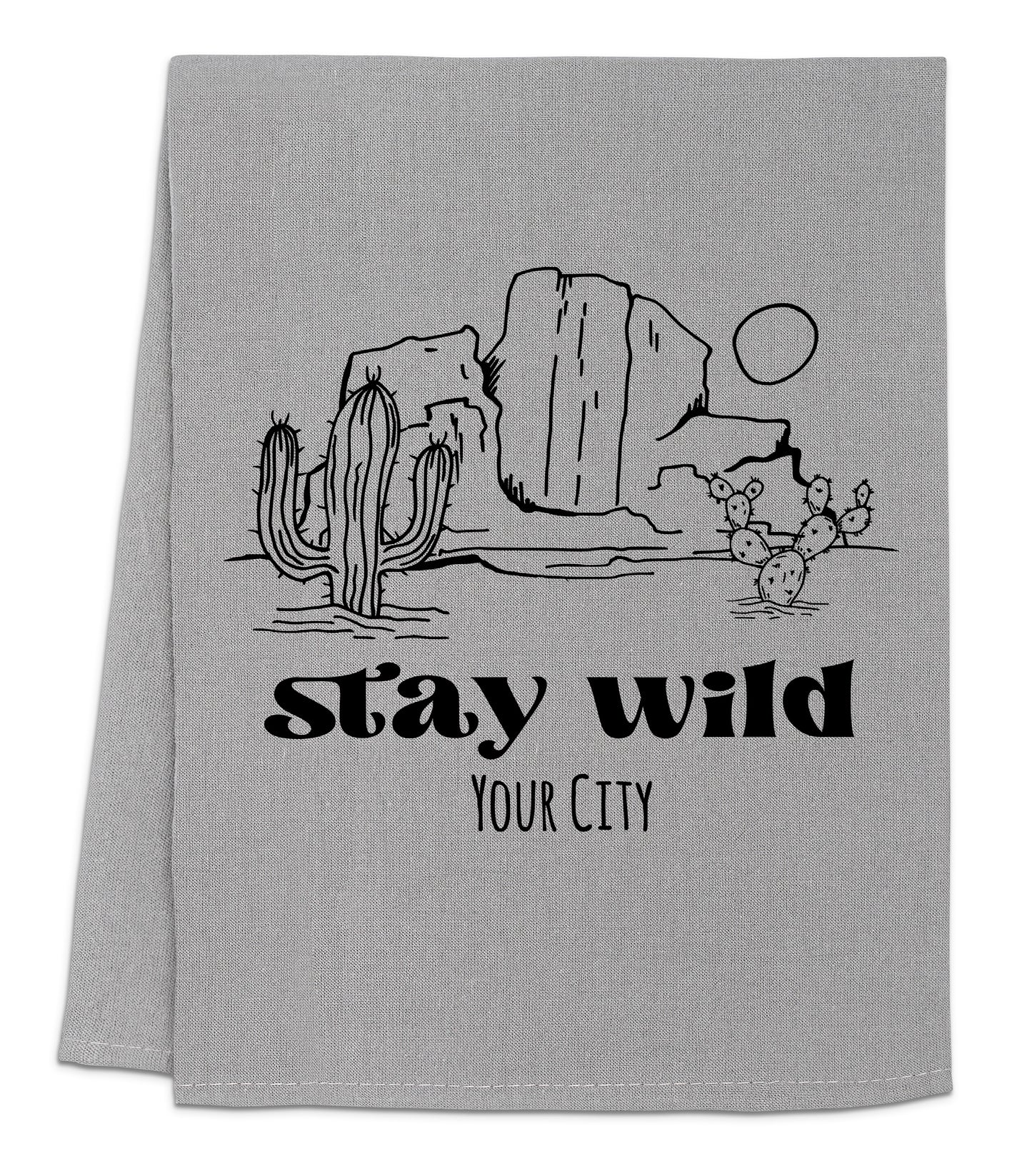 a towel that says stay wild your city