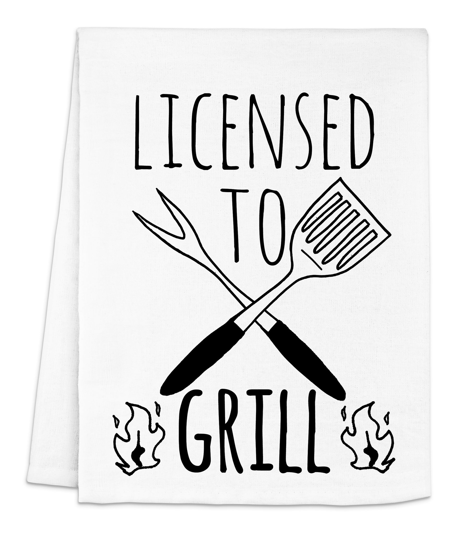 a kitchen towel with a grill and spatula on it
