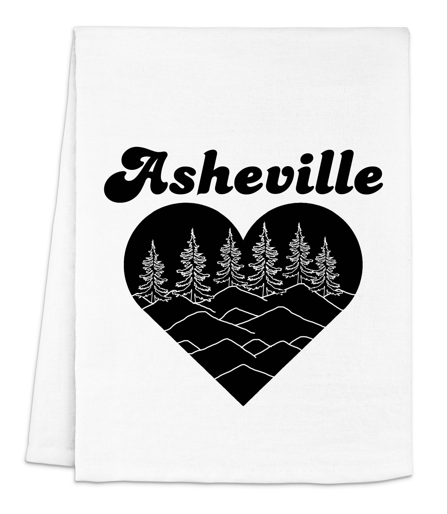 a white dish towel with a black heart and trees on it