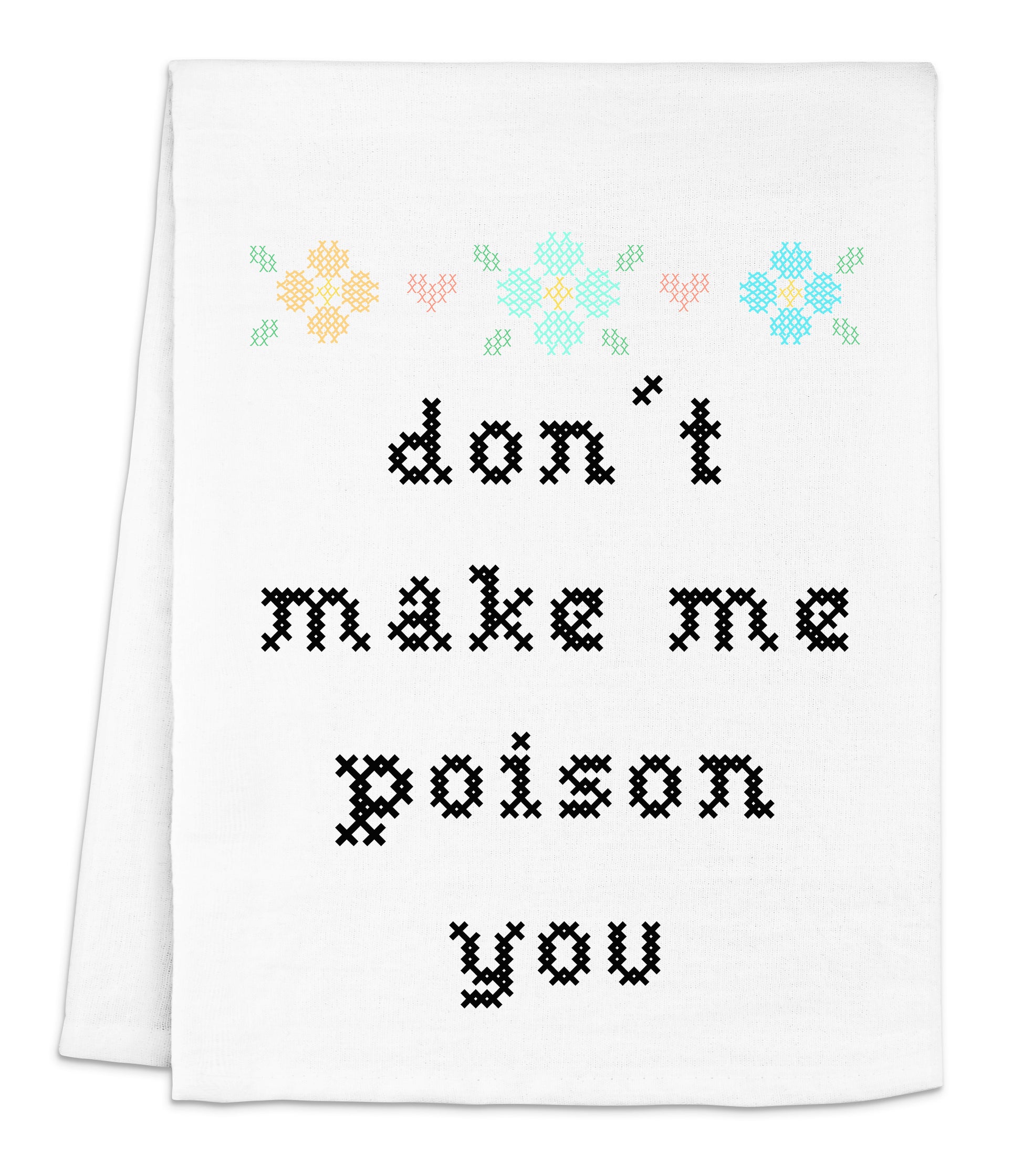 a white dish towel with a cross stitch design