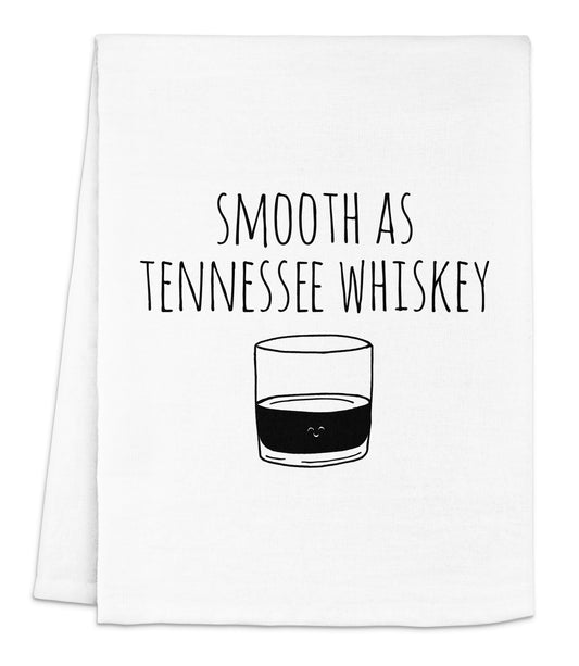 a tea towel with a glass of whiskey printed on it