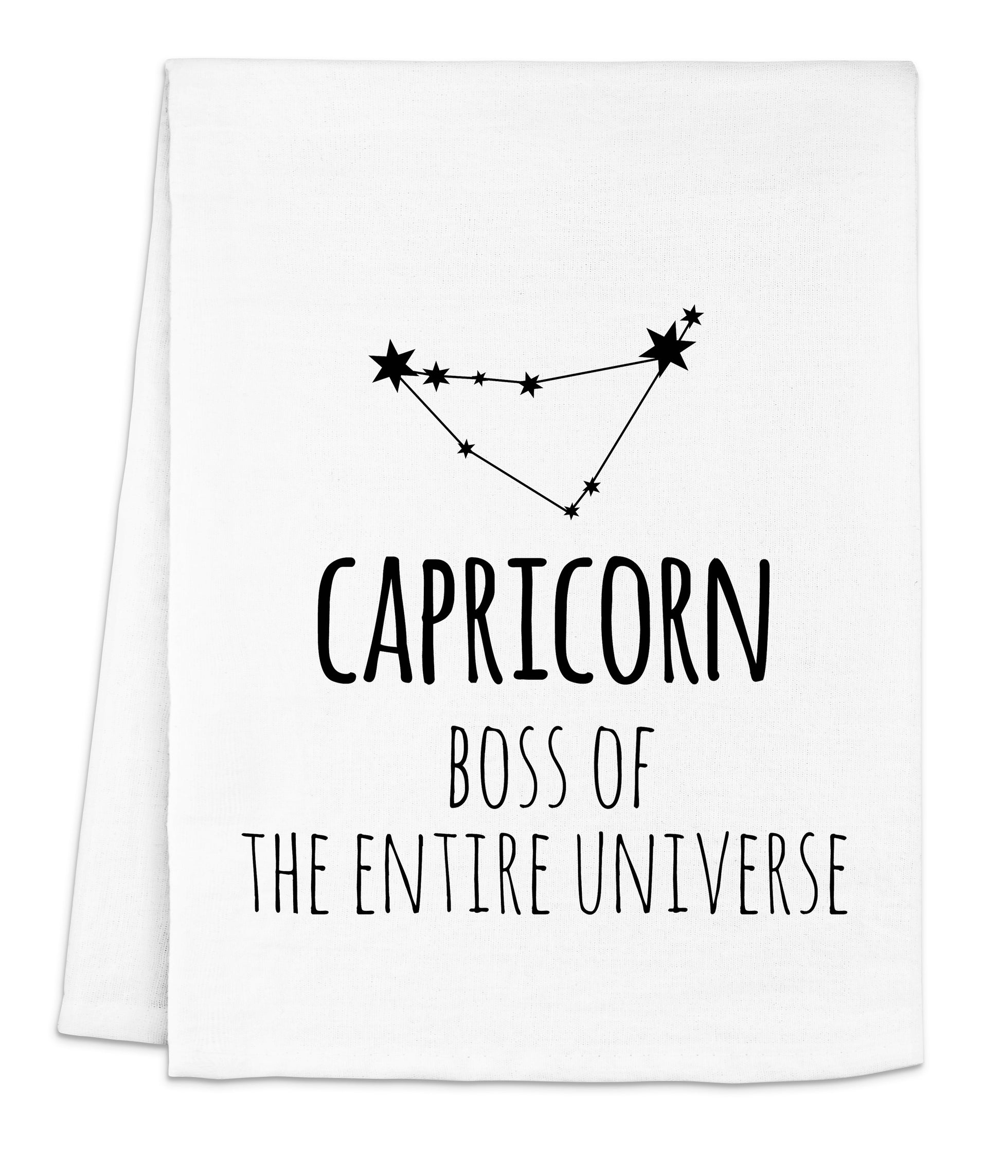 a tea towel with the words capricorn on it