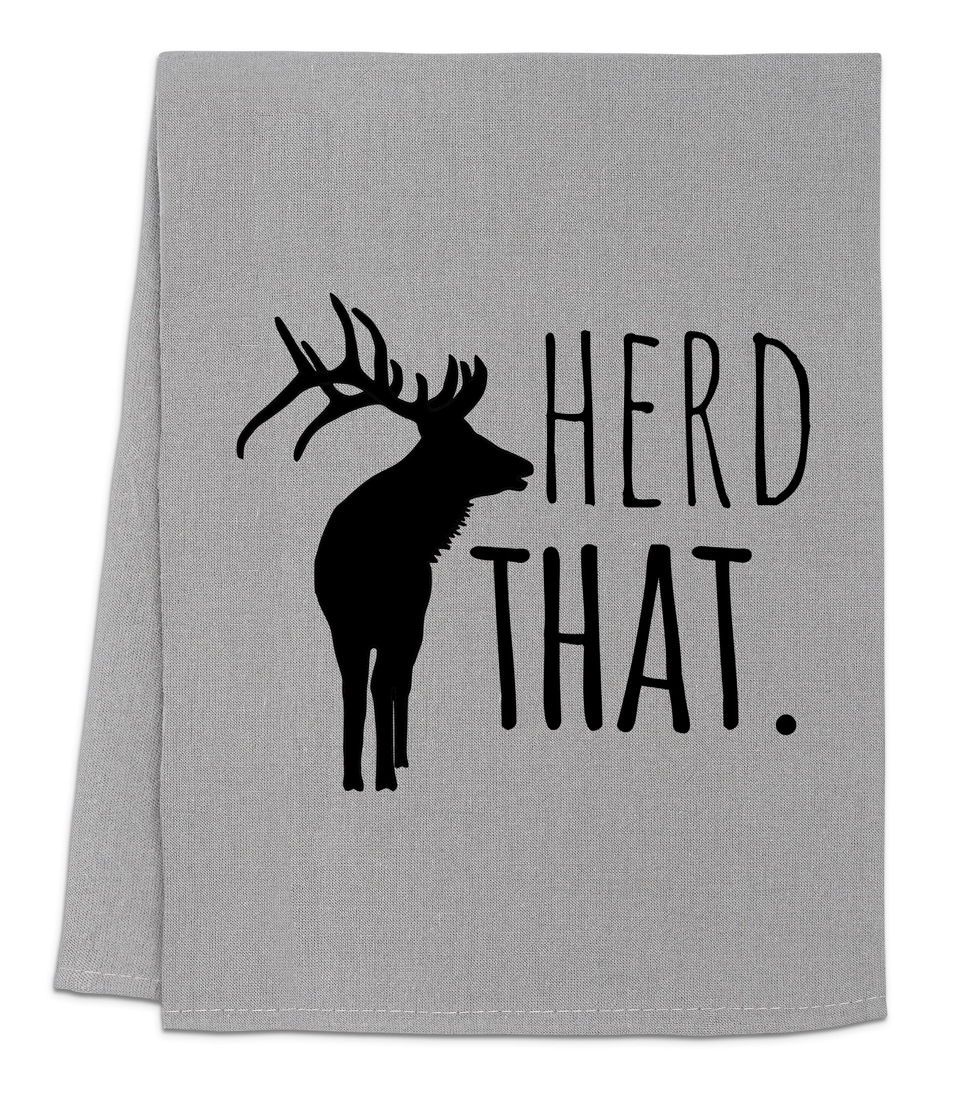 a gray towel with a black deer and the words herd that