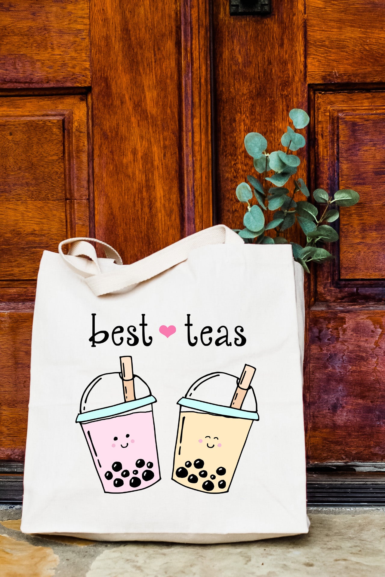 a tote bag that says best teas on it