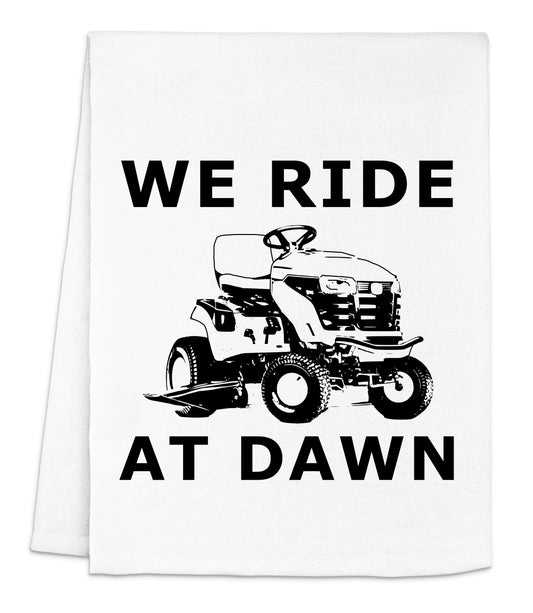 we ride at dawn on a lawn mower