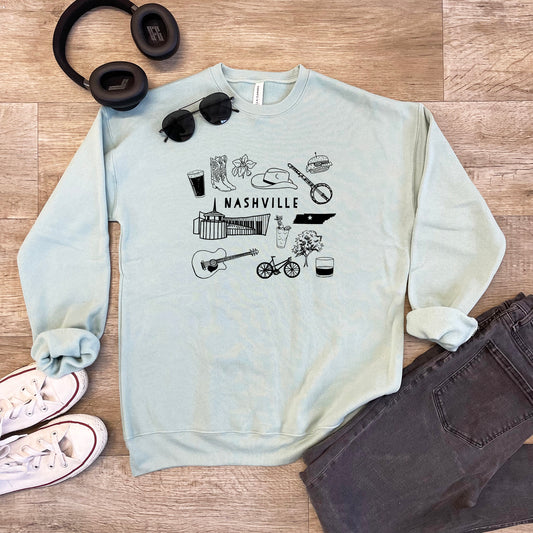a sweatshirt, headphones, sunglasses, and a pair of headphones on a
