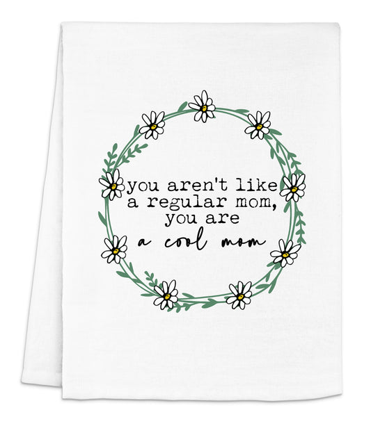 a tea towel with the words you aren't like a regular mom, you