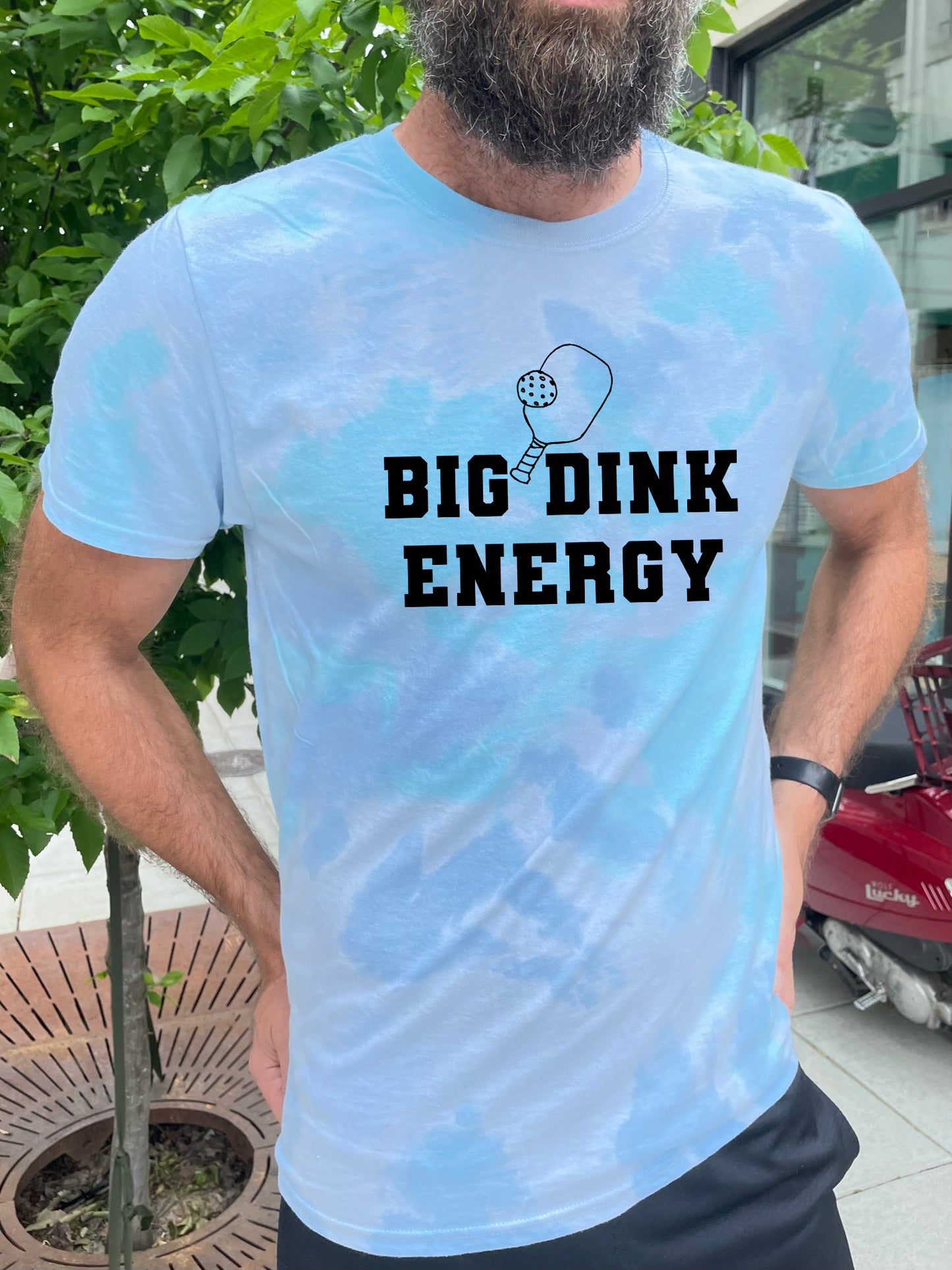 a man with a beard wearing a t - shirt that says, big drink energy