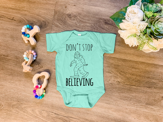 Don't Stop Believing (Bigfoot/ Sasquatch) - Onesie - Heather Gray, Chill, or Lavender