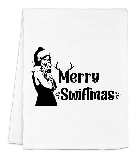 a white dish towel with a black and white image of a woman smoking a cigarette