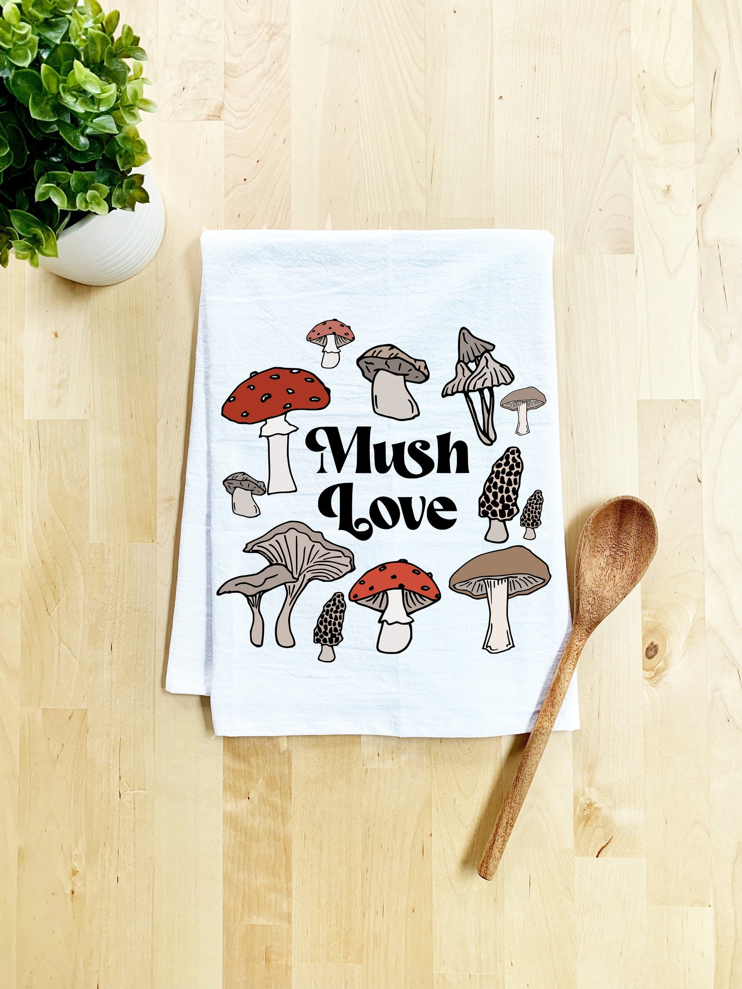 a dish towel with mushrooms printed on it