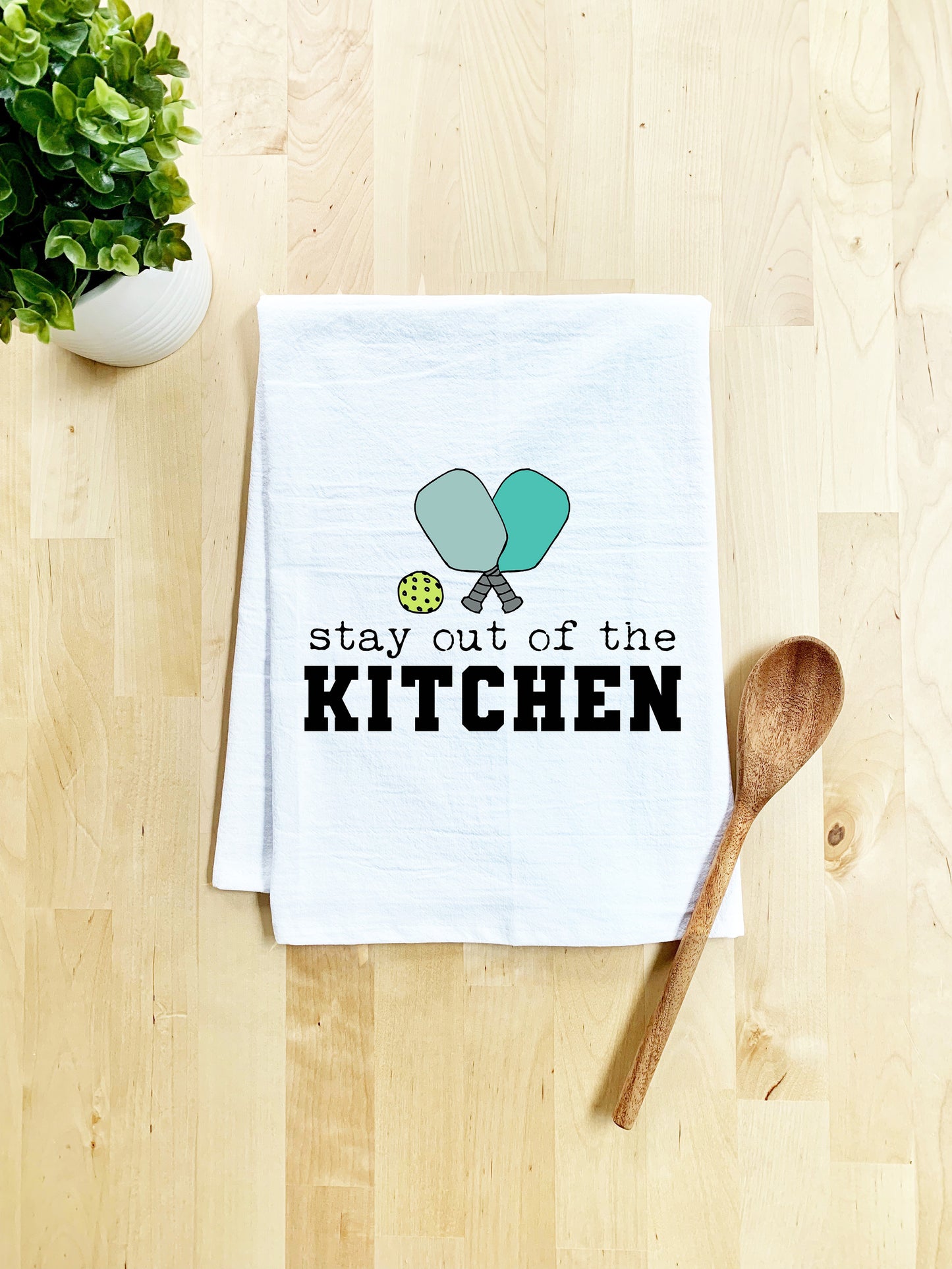 a kitchen towel that says stay out of the kitchen