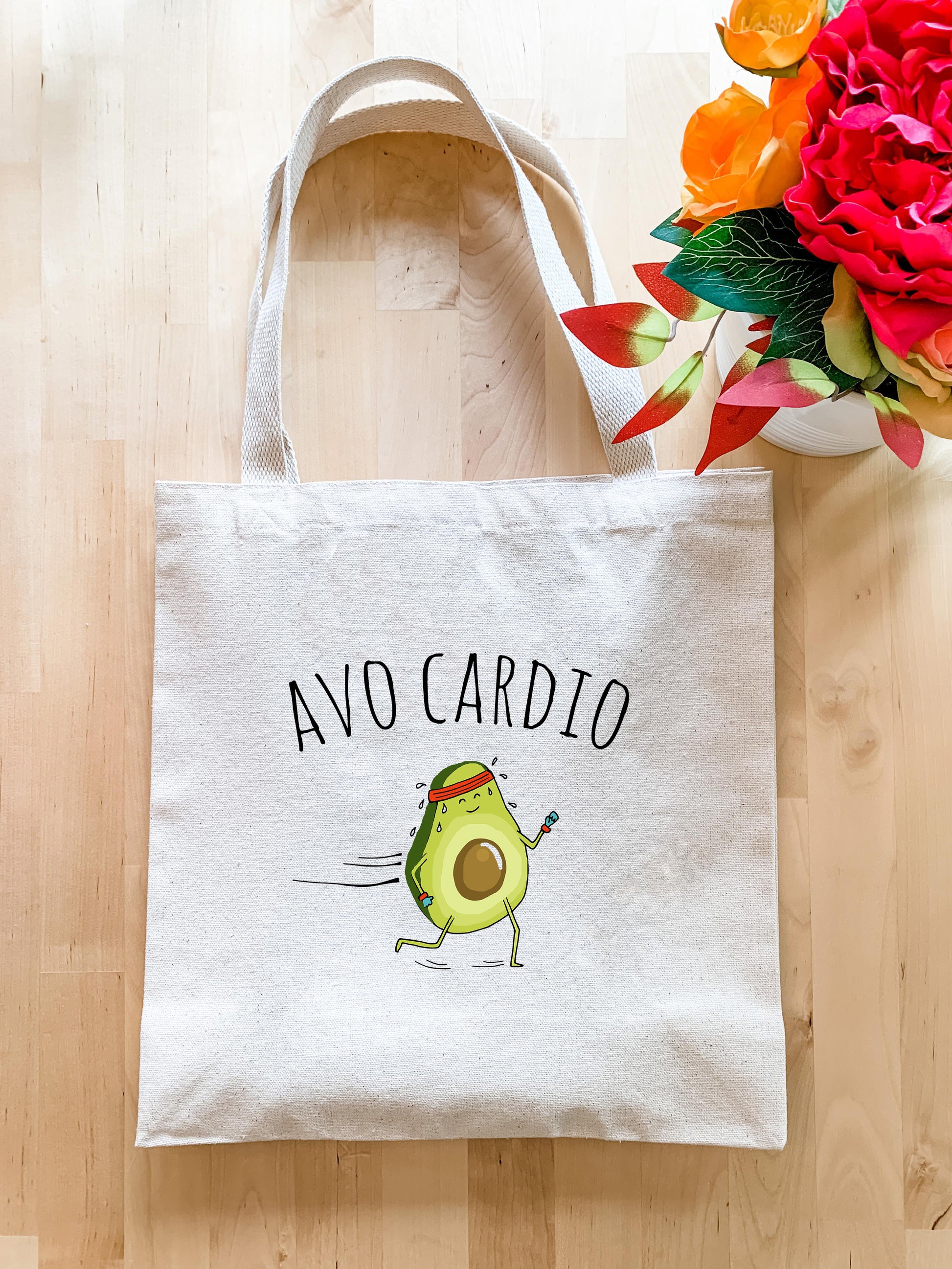 a white bag with a cartoon avocado on it