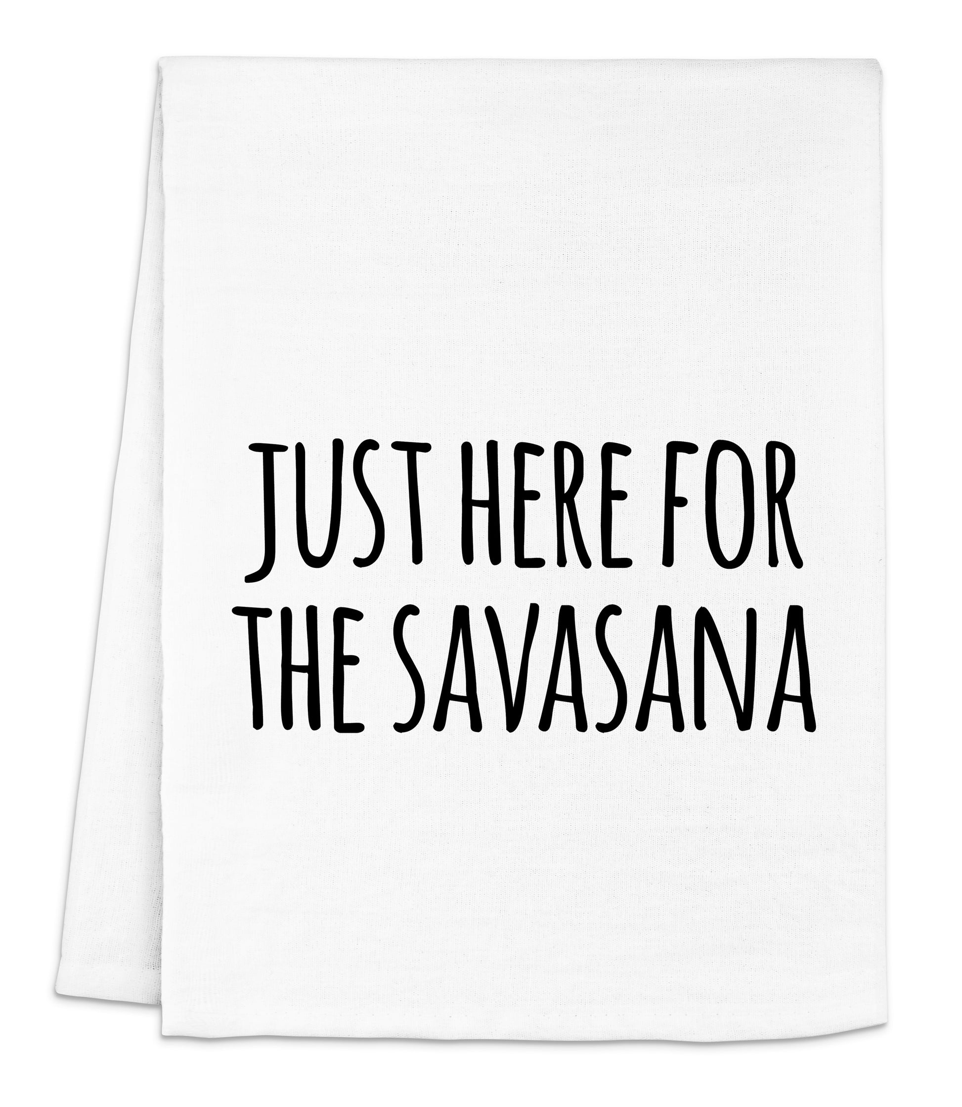 a white napkin with the words just here for the savasana printed on it