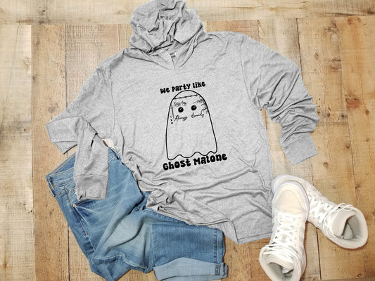 a gray hoodie with a ghost on it