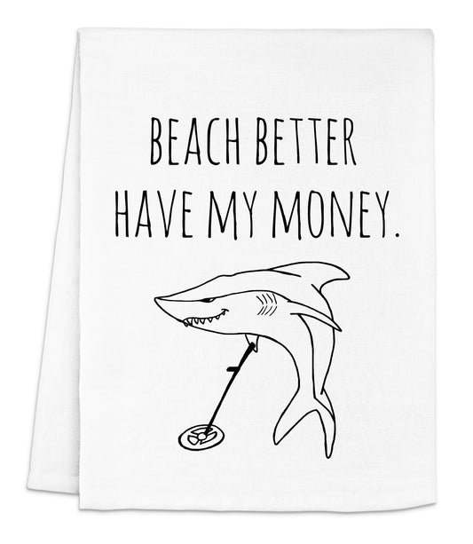 a white towel with a shark on it that says beach better have my money