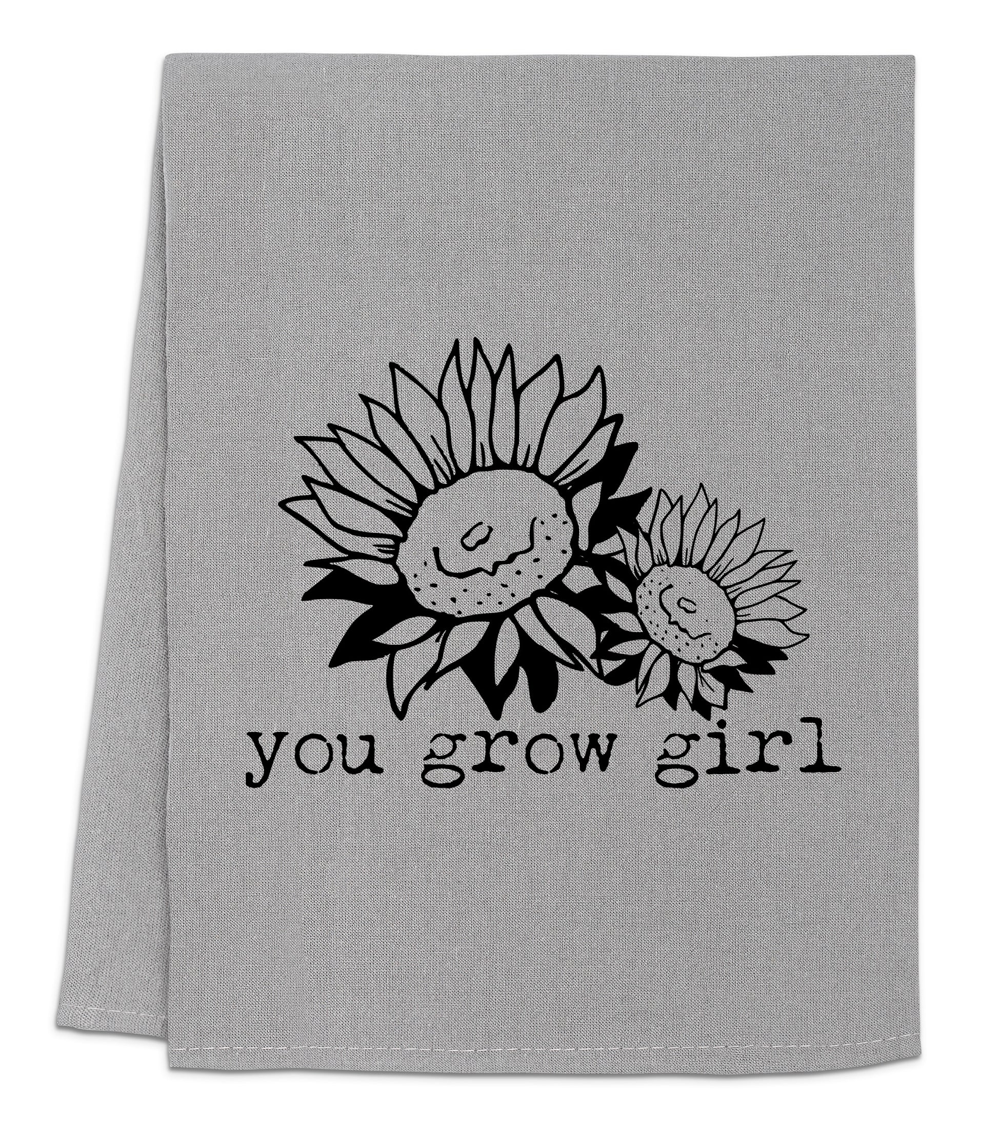 a towel with the words you grow girl printed on it