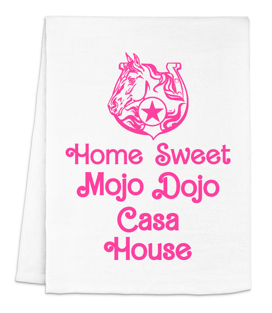 a white dish towel with pink lettering that says home sweet mojo dojo cas