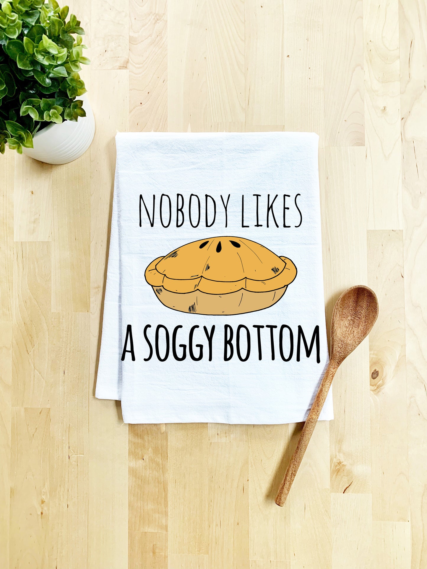 a dish towel with a picture of a loaf of bread on it