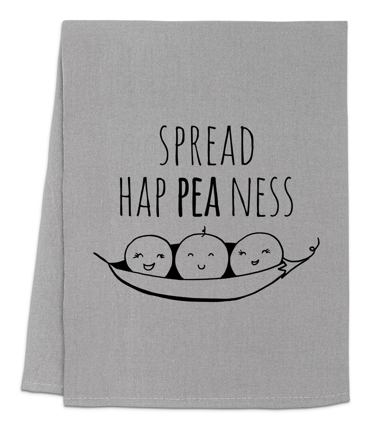 a dish towel with two peas on it